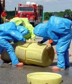 People handling hazardous waste